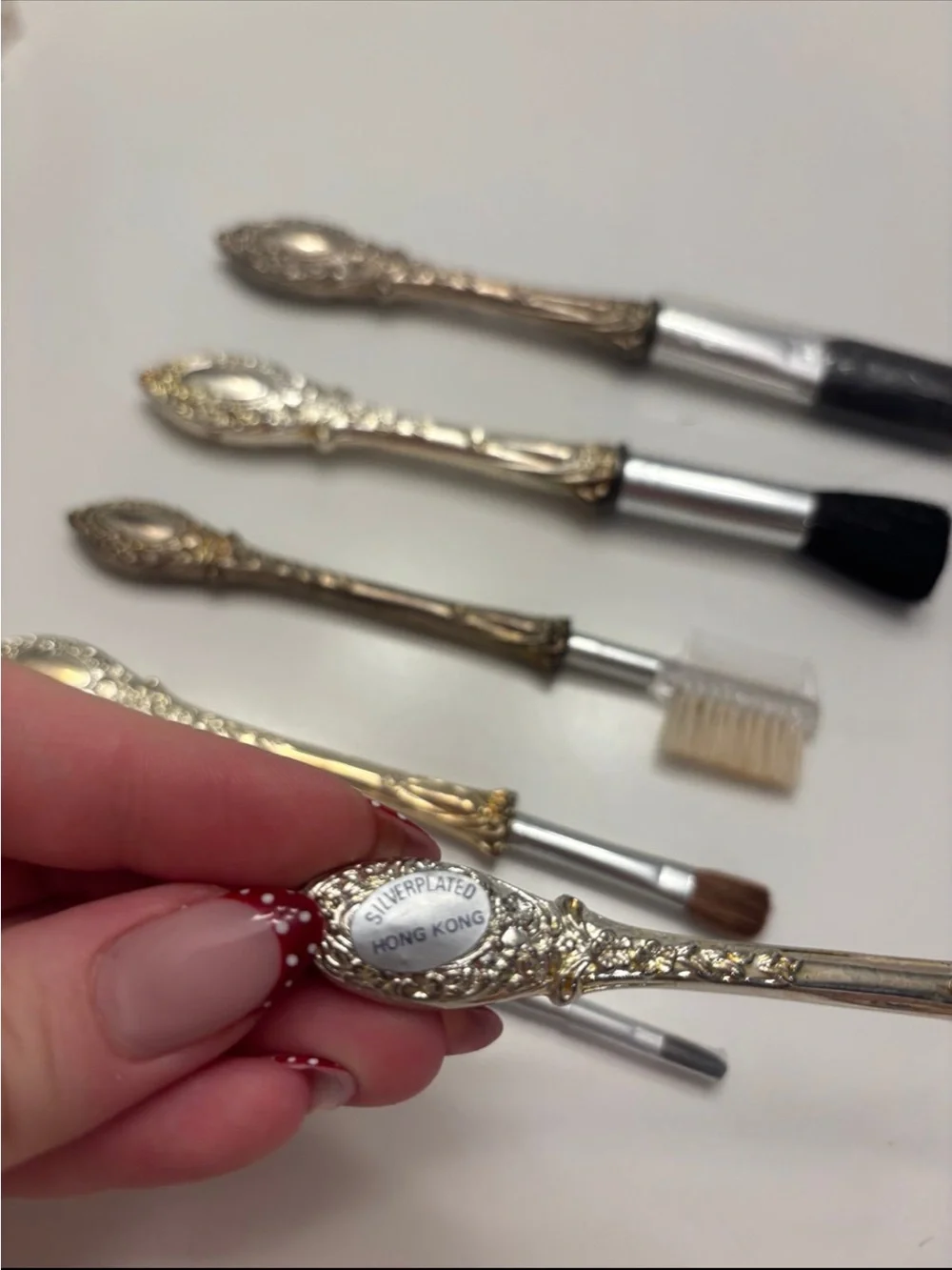 Vintage 6-piece silver-plated makeup brush vanity set with ornate scroll handle